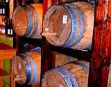 A photo of barrels formenting apple cider vinegar