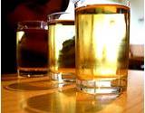a photo of three glasses filled with apple juice good source for flush gallstones 
