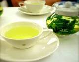 photo of a pot and a cup of green tea for natural fluoride for cavity prevention