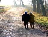 grandma and grandpa taking a long walk to boost immune system