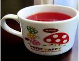 photo of a child's cup full of raspberry leaf tea