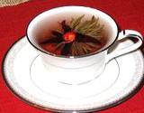 photo of a cup of lavender tea a good source to soak compress for back pain relief