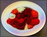 photo of a platefull of differnt colors of roses