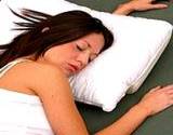 photo of a woman sleeping a sign of sleep disorder remedy working