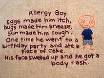 photo of a note written by a child with a drawing about a boy that has food allergies