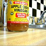 A bottle of organic apple cider vinegar with the mother