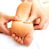 photo of woman getting a foot massage natural remedy for cold feet