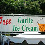 photo of a sign advertising free garlic ice cream too much and might create stomach pain