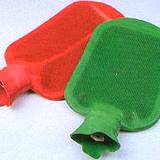 photo of one red and one green hot water bottle a good source to relieve flatulence