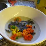photo of a bowl of infused herbal flowers