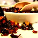 photo of a bowl overflowing with dried rose hips