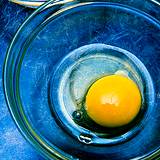 photo of raw eggs in a bowl a likely source of salmonella poisoning