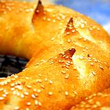 round loaves of golden browned bread made from wheat