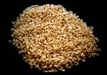 pile of uncooked brown rice