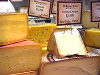 a display of a variety of Italian cheeses