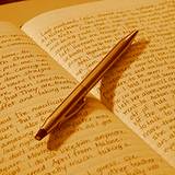 photo of a journal and pen keeping a diary is a good way to reduce sleep disorders