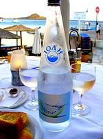 Photo of table set with glasses filled with water to promote hydration